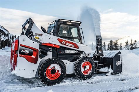 mini skid steer in snow|infront mini skid steer.